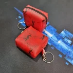 کیف هندزفری برزنتی زیپ دار مدل YSL مناسب ایرپاد و لوازم کوچک